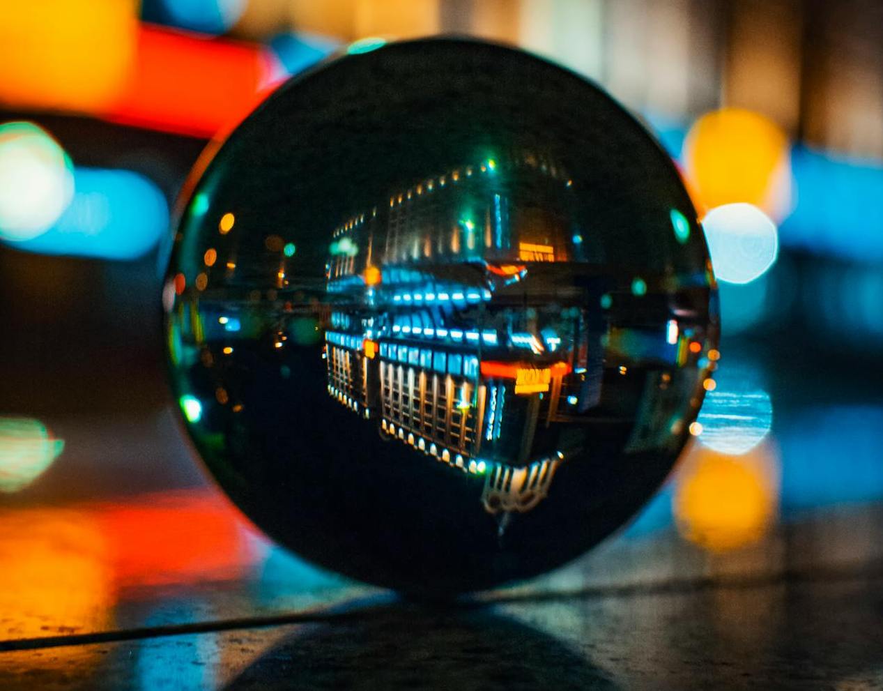 lcd versus led displays image showing glass ball reflecting digital colour spectrum